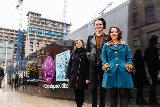 Students with Bruntwood hoardings