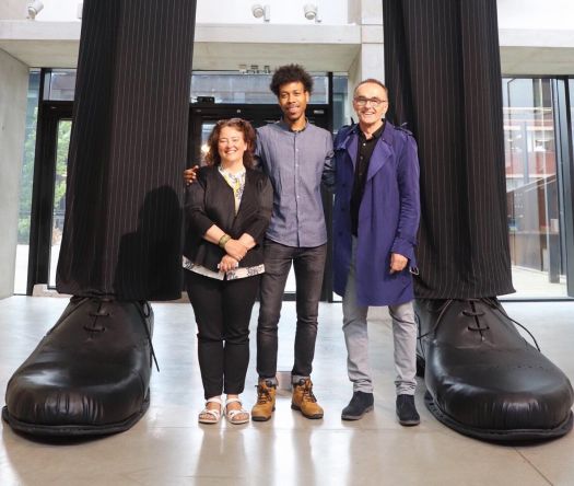 Penny Macbeth, Deputy Faculty Pro-Vice Chancellor and Dean of Manchester School of Art, with recent graduate and glassblower, Jahday Ford, and film director, Danny Boyle, at the Degree Show launch night [NO]