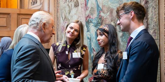 Isabelle Pennington-Edmead (second from right) meets King Charles