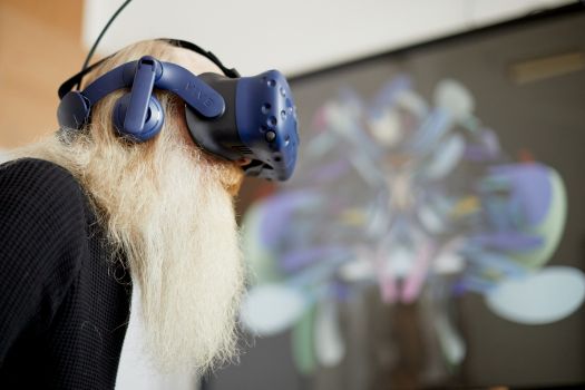 Prof Keith Brown tests out the immersive art experience