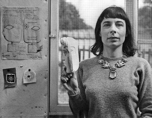 Image showing Mitzi Cunliffe with with preparatory drawings and plaster maquette for the BAFTA mask 1955 [NO]