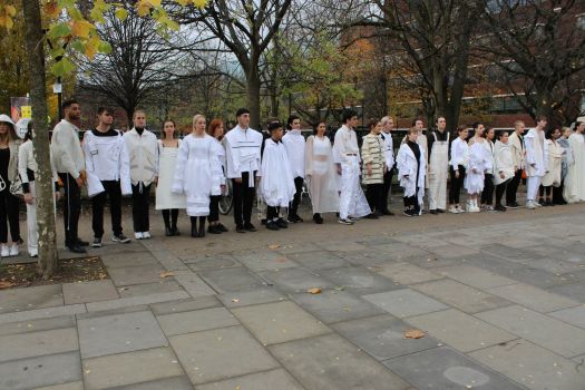 Models for Guerrilla Fashion Show outside All Saints Park.